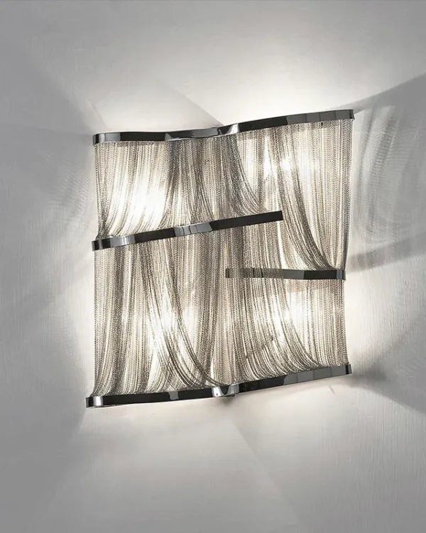 Boucle Iron Wall Sconce in polished chrome